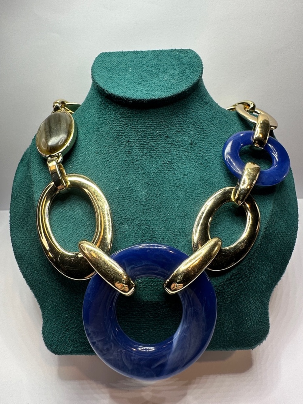 Chico's Gold-Tone Link Necklace with Deep Blue Swirled Lucite Rings